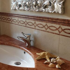 Senini Stone srl | BOISERIE PATINATA CON DECORO INTARSIATO ARTEMIDE
